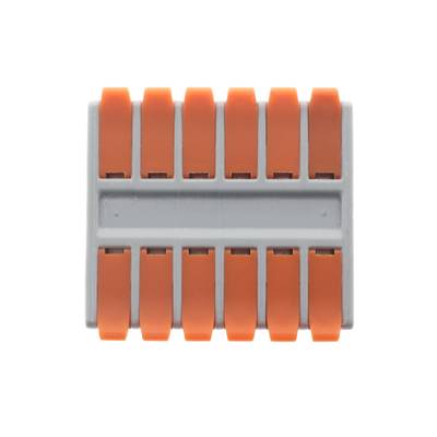 Blok elektrických konektorů s deseti oranžovými páčkami, pohled shora, používaný v instalacích osvětlení LED.