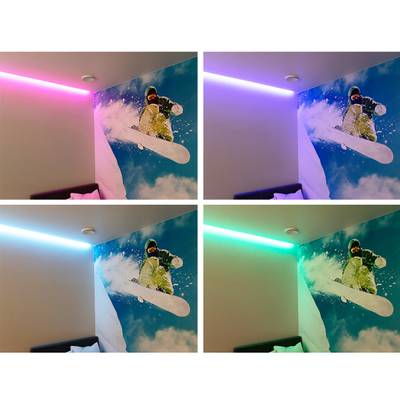 Rohový pokoj s LED světly v růžové, fialové, modré a zelené barvě; nástěnná malba snowboardu na stěně. Optimalizujte atmosféru pomocí jasného LED osvětlení.