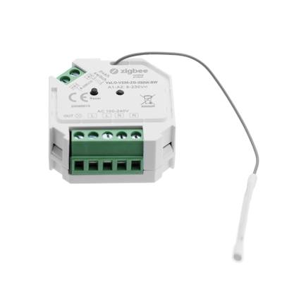 Bílý inteligentní spínač Zigbee, zelené konektory, nálepka s technickými údaji, bílý anténní vodič na straně pro ovládání LED osvětlení.