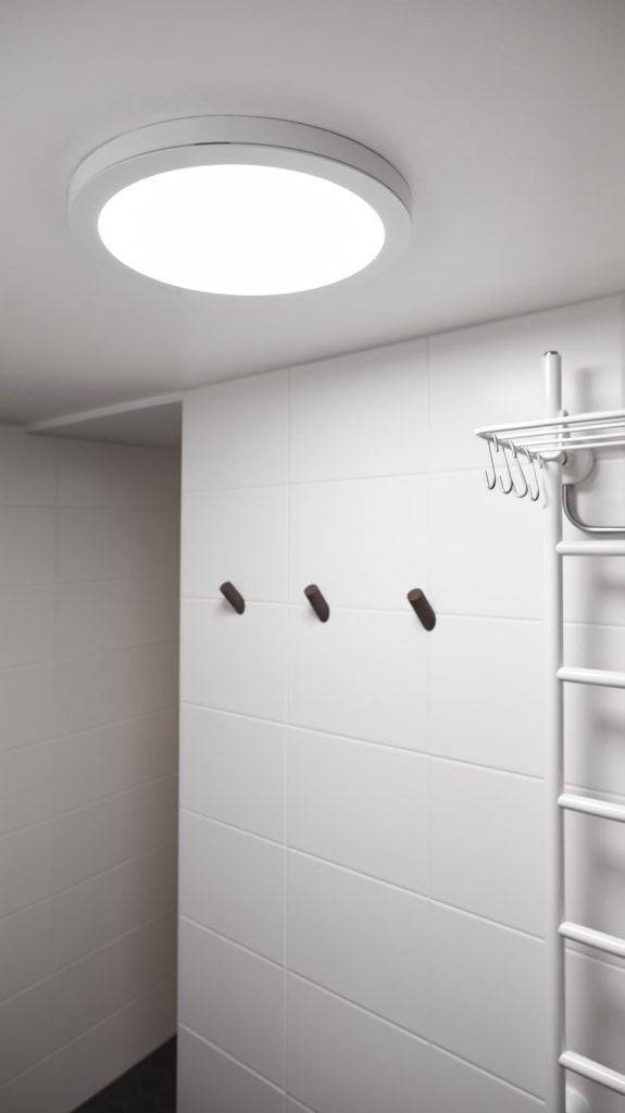Zelené pozadí s bílými čtvercovými obrysy a nápisem "LED STORE" tučným bílým písmem, který zdůrazňuje energeticky účinná řešení osvětlení.